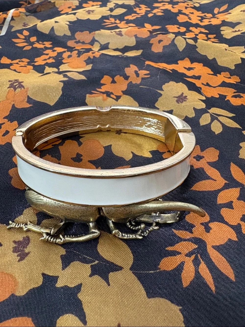 White Enamel Hinged Bangle Bracelet with Geometric Plumeria Accent